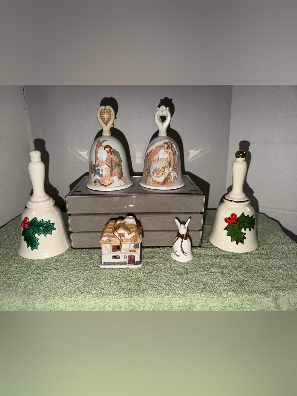 Porcelain Christmas Bell Set with Nativity and Holly Motifs